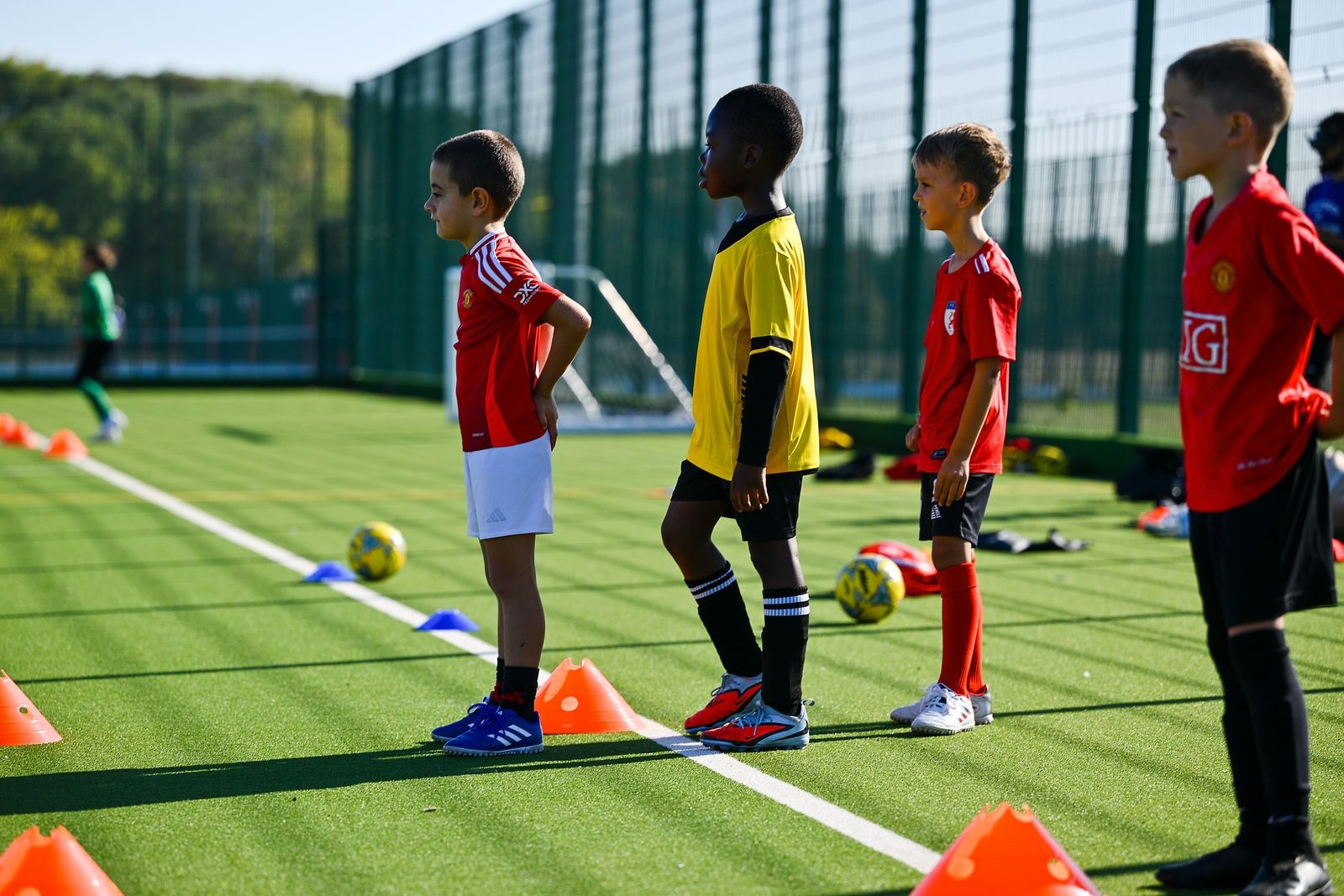 Players waiting their turn at a cone drill